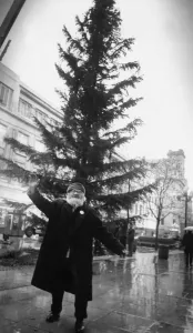 Prints of Liverpool Street musician Augustus Broll does a jig around the Christmas tree in Church Street. 25th November 1982 Dance Prints: Liverpool Street Christmas Jig Print 25th November 1982