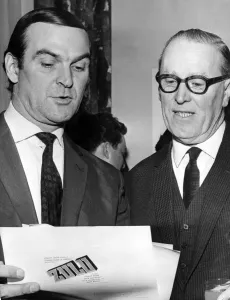 Stanley Baker chats with Mr. Julian Hodge at the Park Hotel, Cardiff Print 1964