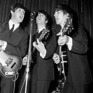 Entertainment In The 1960s Prints: Paul McCartney, John Lennon and George Harrison of the Beatles seen here performing