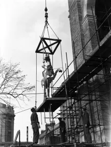 Bristol Landmarks Prints: One of the gilded unicorns seen here being hoisted up on to the roof of Bristol City Hall