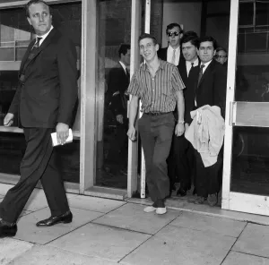 London Airport Arrivals Prints: Stiff and limping, home-sick Welshman Brian Robson, 19, who tried to send himself back to