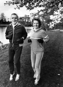 Prints of Jaguar boss Mr John Egan sets out on a morning run with his wife Julia. 23rd April 1983 Industrialist Prints: Jaguar Boss Mr John Egan Morning Run Print, 23rd April 1983