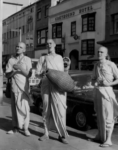 South West England Landmarks Prints: Hare Krishna trio. Three Hare Krishna devotees spreading the word in Broadmead, Bristol