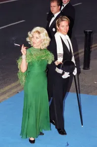 Lulu and Jordan at Elton John's 50th Birthday Party Print, April 1997