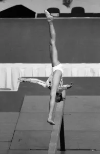 Prints of The 1976 Summer Olympics in Montreal, Canada. Womens Gymnastics. Pictured, Romanias Nadia Comaneci. July 1976 Romania Prints: 1976 Montreal Olympics Print: Nadia Comaneci in Action