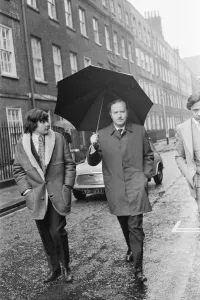 Prints of Mr James Douglas Spooner, pictured holding his umbrella, who is taking over as Manager and Receiver of The Beatles. Picture taken at The Law Courts Weather Prints: Mr James Douglas Spooner, Receiver of The Beatles' Print