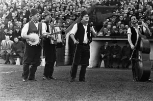 Prints of Adge Cutler and The Wurzels perform before the fans at the Bristol City ground, Ashton Gate. 15th February 1967 Bristol Prints: Print of Adge Cutler and The Wurzels live at Bristol City ground