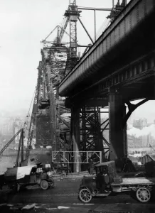 Prints of Construction of the new Tyne Bridge. The bridge on the Gateshead side. The Tyne Bridge is a through arch bridge over the River Tyne in North East England, linking Newcastle upon Tyne and Gateshead 1400to1499 Prints: Print of the Gateshead side construction, Tyne Bridge, 19th February 1928