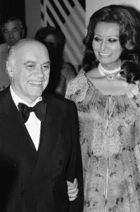 Prints of Carlo Ponti and Sophia Loren attend a dinner at the Sporting Casino, Monte Carlo, to celebrate the 50th Anniversary of the International Variety Club. 3rd May 1977 Monaco Prints: Carlo Ponti and Sophia Loren at the Sporting Casino Print, 1977