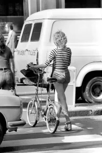 00060 Gallery: Model with a bicycle in Kings Road Chelsea, London. April 1975 75-2156-009