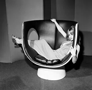 Model on a chair at the Design Centre, Haymarket, London, 13th November 1970