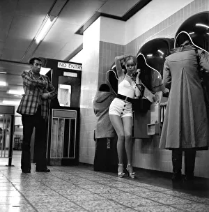 Model Christine Donna seen here using the public telephones at Holborn tube station Model Christine Donna seen here using the public telephones at Holborn tube station