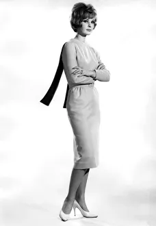 Model Dawn Chapman wearing long dress, arms folded. February 1962 P008889 Model Dawn Chapman wearing long dress, arms folded. February 1962 P008889