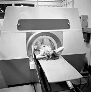 Model Gillian Duxbury in E.M.I. X-Ray scanner. April 1975 75-1905-006