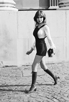 Images Dated 17th February 1971: Model and horror film actress Madeline Smith poses wearing hot pants suit with knee high