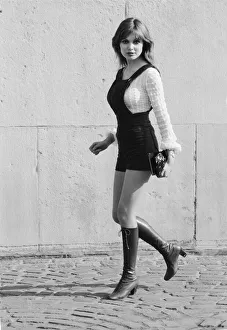 Images Dated 17th February 1971: Model and horror film actress Madeline Smith poses wearing hot pants suit with knee high