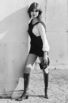 Images Dated 17th February 1971: Model and horror film actress Madeline Smith poses wearing hot pants suit with knee high