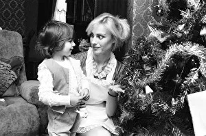 Model Janet Slaven seen here helping to dress a Christmas tree December 1982 Model Janet Slaven seen here helping to dress a Christmas tree December 1982