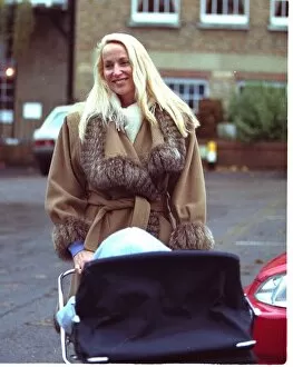 Model Jerry Hall leaves home today with baby son Gabriel in the pram