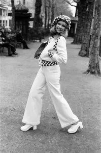 Model Jo Howard pictured wearing Oxford bags and battle blouse - Ready To Wear fashions Model Jo Howard pictured wearing Oxford bags and battle blouse - Ready To Wear fashions
