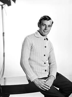 00068 Gallery: Model John Handy wearing cardigan in Reveille Studio. 1960