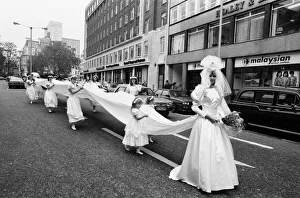 Model Michelle Hardy and a squad of bridesmaids show off her wedding dress Model Michelle Hardy and a squad of bridesmaids show off her wedding dress