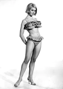Model Vyoyan Dunbar wearing a frilly bikini outfit. July 1965 P009023 Model Vyoyan Dunbar wearing a frilly bikini outfit. July 1965 P009023