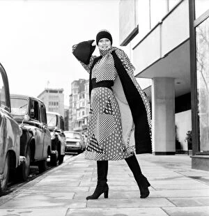 Images Dated 15th April 1975: Model wearing a checkered and patterned dress with matching skirt