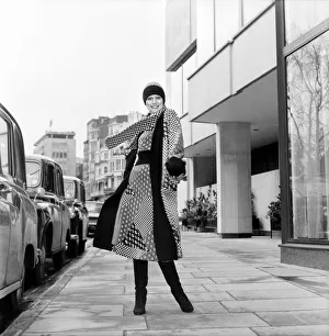 Images Dated 15th April 1975: Model wearing a checkered and patterned dress with matching skirt