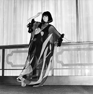 Images Dated 15th April 1975: Model wearing a dress with see through garment on top during a Japanese Fashion Show