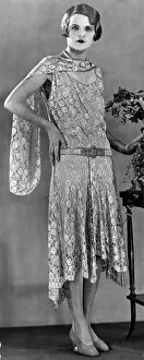 Images Dated 10th February 2005: A model wearing a long patterned dress showing the popular uneven hemline in 1929