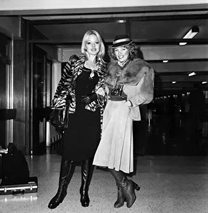 Models Lilian Muller (blonde) and Suze (in hat) leaving Heathrow Airport for Chicago Models Lilian Muller (blonde) and Suze (in hat) leaving Heathrow Airport for Chicago