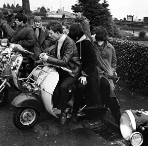 00573 Gallery: Mods gather on the sea front at Clacton on their scooters over the 1964 Easter weekend