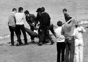 Mods youth culture throwing a person in to the sea on Margate beach Mods youth culture throwing a person in to the sea on Margate beach