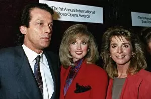 Morgan Fairchild centre with Leslie Grantham left and Jan Harvey right at the first
