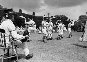 Images Dated 12th March 2008: Morris dancers at Thaxted in Essex perform on the village green. June 1939 P029097