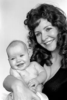 Images Dated 21st February 1975: Mother and Child: 'Miss Brighton 1990'. Will little 3-month-old Tanya follow in