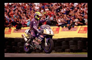 Motorcycle racing August 1998 cyclist waves to crowds Motorcycle racing August 1998 cyclist waves to crowds