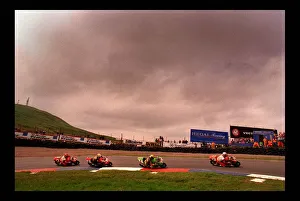 Motorcycle Racing August 1998 cyclists drive around track Motorcycle Racing August 1998 cyclists drive around track