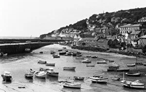 Images Dated 1st June 1975: Mousehole Harbour. Mousehole is a village and fishing port in Cornwall, England