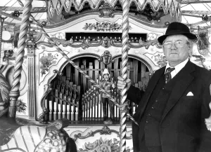 Mr. James Crowe with the renovated Verbeck organ at Whitley Bay fairground in August 1976 Mr. James Crowe with the renovated Verbeck organ at Whitley Bay fairground in August 1976