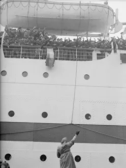 Mrs Buggins seen here waving off her son as the troopship Dunera sails for the far east Mrs Buggins seen here waving off her son as the troopship Dunera sails for the far east