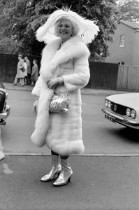 Mrs. Gertrude Shilling wearing a Ostrich feather hat with white Mink and Fox fur coat Mrs. Gertrude Shilling wearing a Ostrich feather hat with white Mink and Fox fur coat