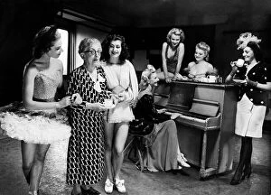 00479 Gallery: Mrs Laura Henderson owner of the Windmill Theatre seen here taking coffee with some of