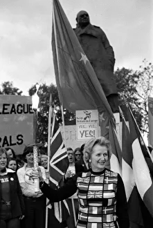 Mrs Margaret Thatcher March 1975 holding the European flag under the statue of Sir Mrs Margaret Thatcher March 1975 holding the European flag under the statue of Sir