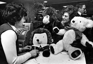 Images Dated 23rd November 1976: Mrs Suzanne Delville buys toys for her grandchildren during a shopping spree Rackhams