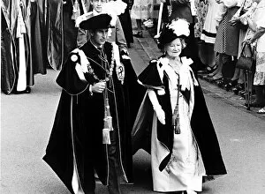 MSI Queen Mother accompanied by Prince Charles proceeds to the St Georges Chapel for