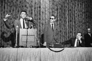 Muhammad Al in a press conference leading up to his bout with Ernie Terrell Muhammad Al in a press conference leading up to his bout with Ernie Terrell
