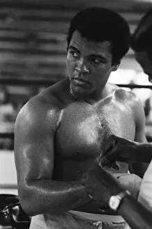 Images Dated 27th August 1974: Muhammad Ali (Cassius Clay) training at his Pennsylvanian mountain retreat for his fight