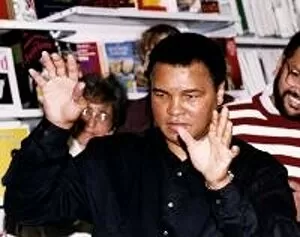 Images Dated 15th November 1993: Muhammad Ali (Cassius Clay) former world heavyweight boxing champion with hands up at W